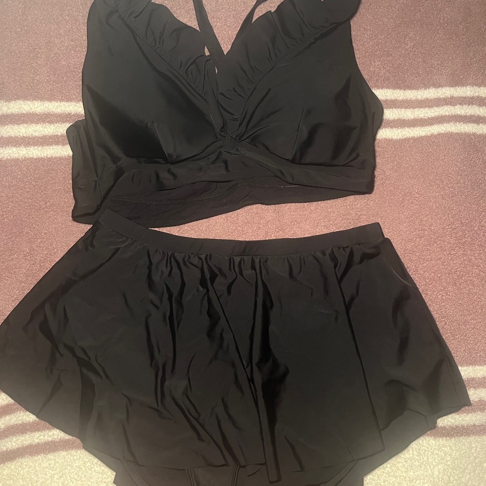 Cute Torrid black 2-piece swimsuit with ruffle top